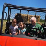 Girls and Ginny in Utility Vehicle